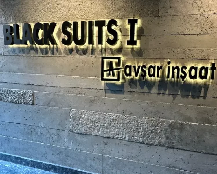 avsar-insaat-black-suits-04